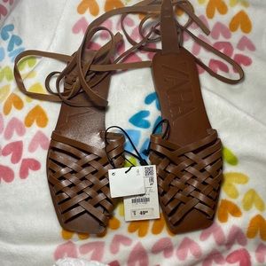 Brown leather w/wrap around straps